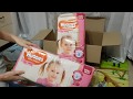 Видео - Распаковка подгузников Huggies Ultra Comfort 5 Mega для девочек 112 шт (56x2)  из  Rozetka.com.ua